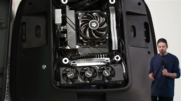 TX 4060塞进电竞椅：一根线即可运行电子pg这椅子不简单！9800X3D+R(图2)